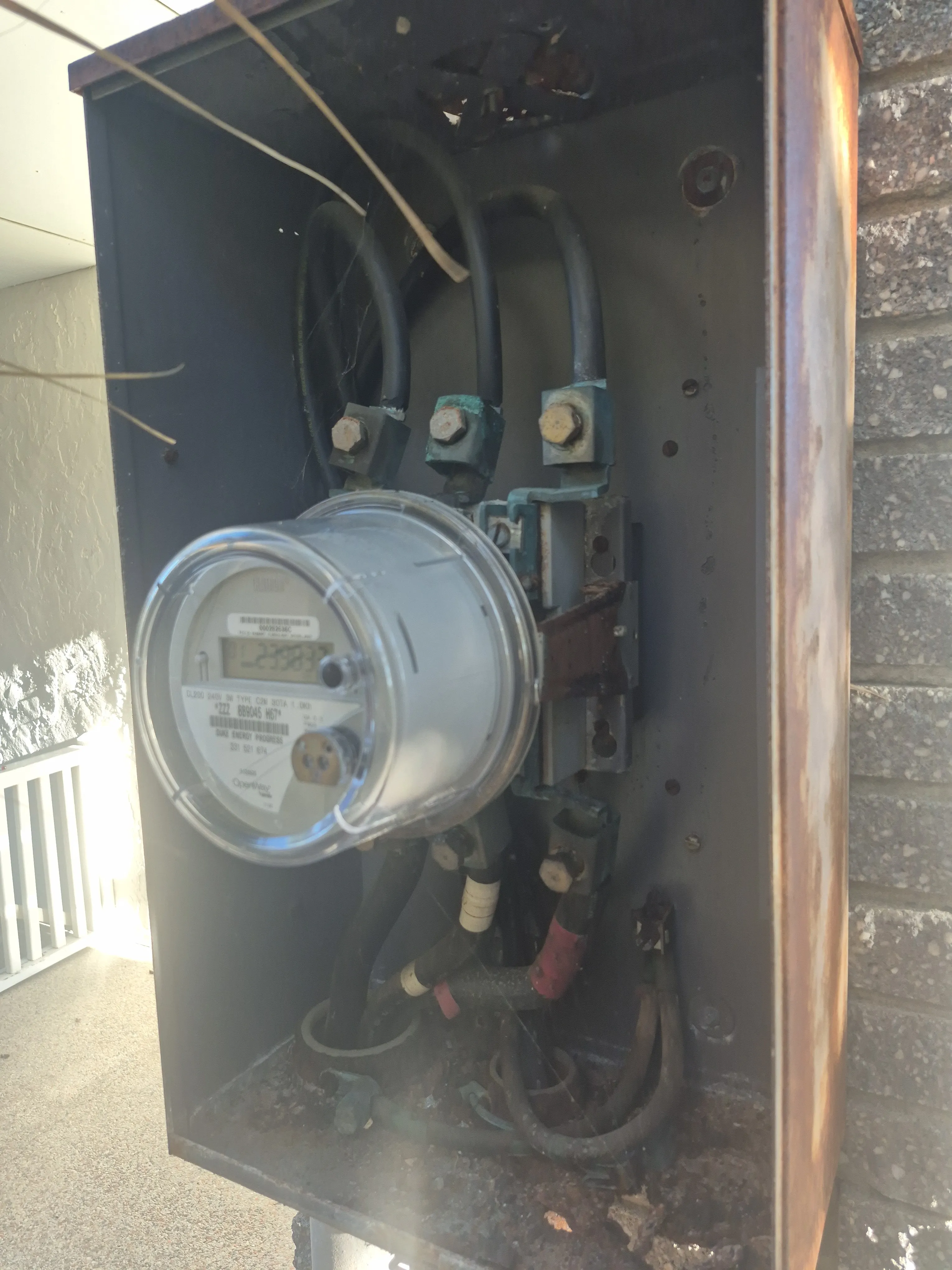 Corrosion-damaged 400-amp electrical service equipment at a Wrightsville Beach waterfront home.