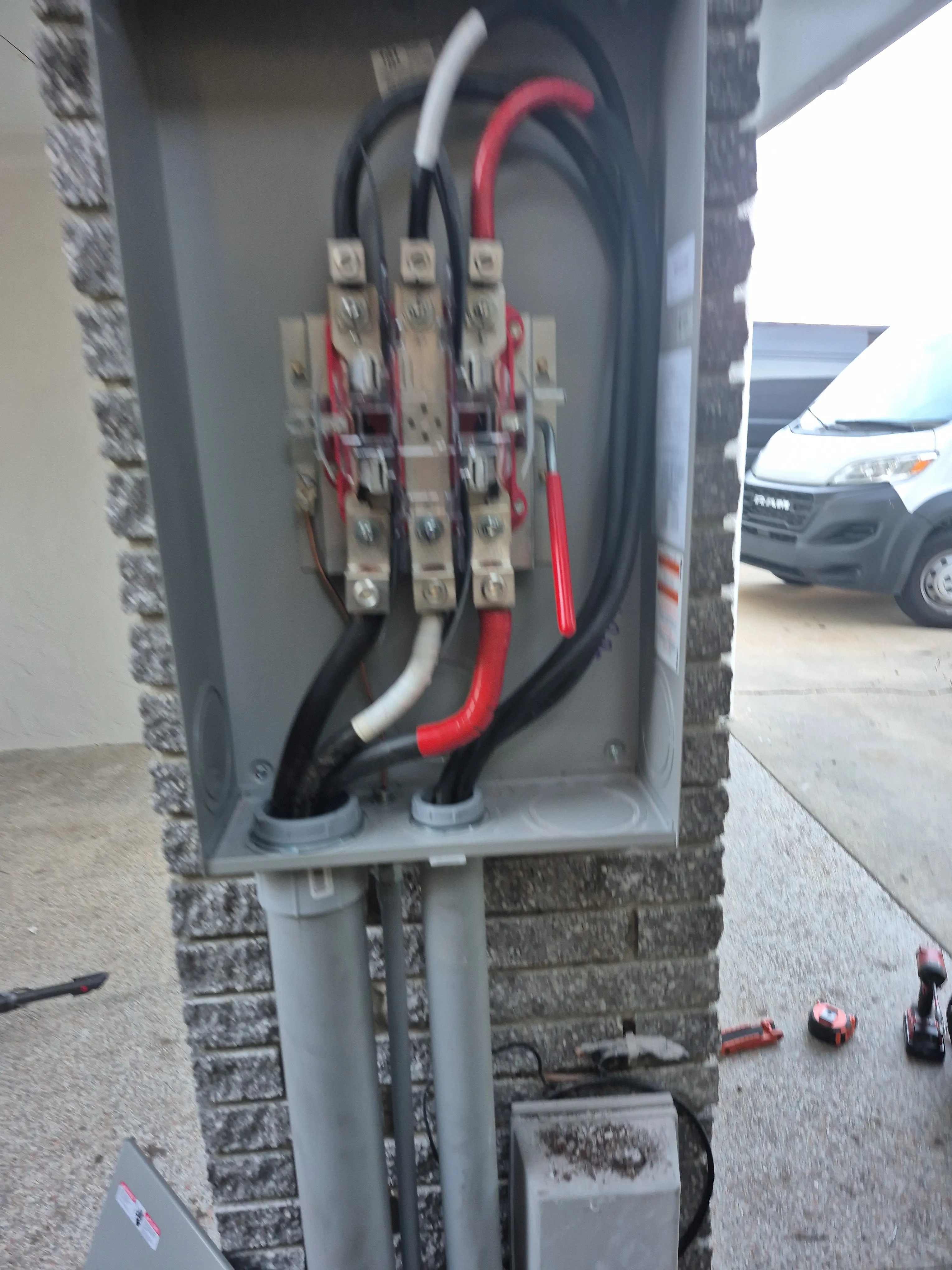 Replacement 200-amp electrical panels installed during a 400-amp service upgrade in Wrightsville Beach.