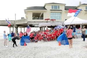A group of Liam Strong Charity Beach Run participants gathered at the start of a previous event on Wrightsville Beach.