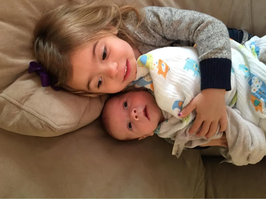 Liam Fredric Batten resting with his sister in a family photograph shared by the Liam Strong Charity Beach Run organizers.