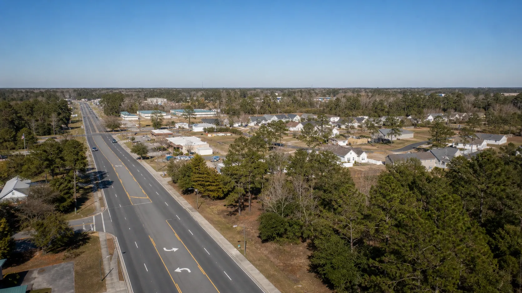 Neighborhood road scene representing Skippers Corner, North Carolina.